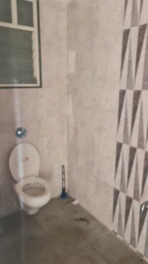 Bathroom in 2 BHK Apartment at Kohinoor Reina, Kondhwa – for Rent