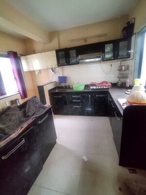 Kitchen in 2 BHK Apartment at Amrut Runwal Daffodils, Nibm – for Sale