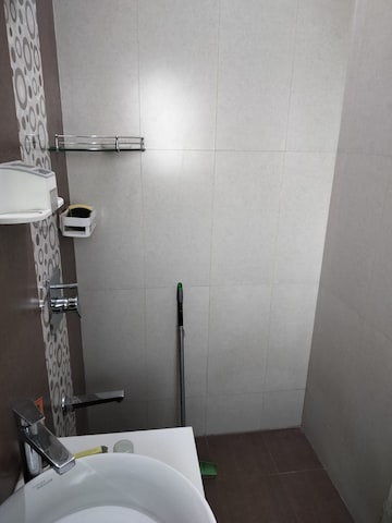 Bathroom in 1 BHK Apartment at Raunak Delight, Owale – for Rent