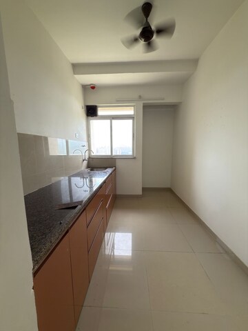 Kitchen in 1 BHK Apartment at Raunak Delight, Owale – for Rent