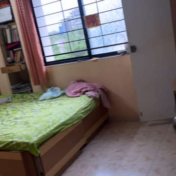 Bedroom in 2 BHK Apartment at Ruturang Complex, Walvekar Nagar – for Rent