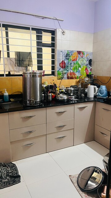 Kitchen in 3 BHK Apartment at Rama Apartment, Walvekar Nagar – for Rent