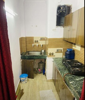 Kitchen in 1 BHK Builder Floor at Khirki Extension – for Rent