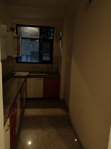 Kitchen in 3 BHK Builder Floor at Guru Nanak Enclave, Dhakoli – for Sale