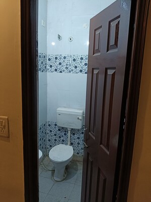 Bathroom in 3 BHK Builder Floor at Guru Nanak Enclave, Dhakoli – for Sale