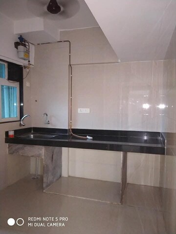 Kitchen in 1 BHK Apartment at Cosmos 27 Gbr, Kasarvadavali – for Rent
