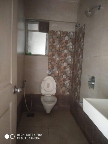 Bathroom in 1 BHK Apartment at Cosmos 27 Gbr, Kasarvadavali – for Rent