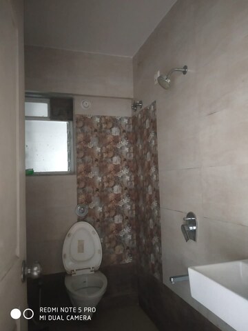 Bathroom in 2 BHK Apartment at Cosmos 27 Gbr, Kasarvadavali – for Rent