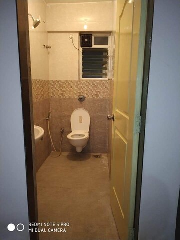Bathroom in 2 BHK Apartment at Cosmos 27 Gbr, Kasarvadavali – for Rent