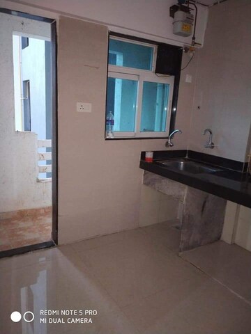 Kitchen in 2 BHK Apartment at Cosmos 27 Gbr, Kasarvadavali – for Rent