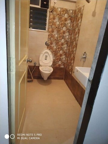 Bathroom in 2 BHK Apartment at Cosmos 27 Gbr, Kasarvadavali – for Rent