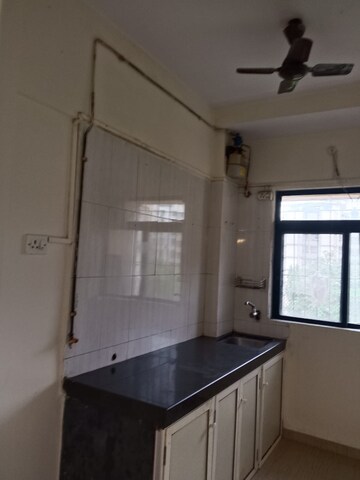 Kitchen in 2 BHK Apartment at Puranik City, Kasarvadavali – for Rent