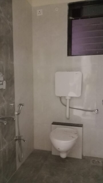 Bathroom in 2 BHK Apartment at K M Horizon Palms, Owale – for Rent