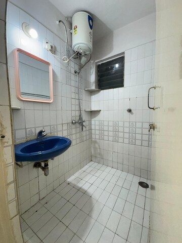 Bathroom in 1 BHK Apartment at Ramesh Hermes Heritage Phase 2, Shastrinagar – for Rent