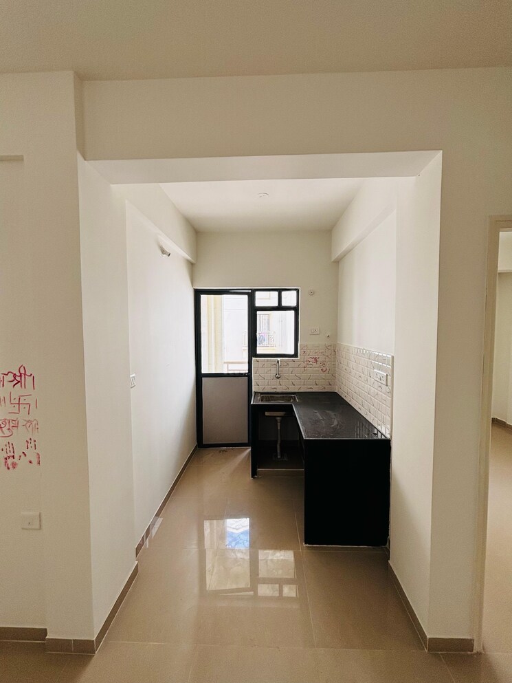 Kitchen, peninsula-address-one 2 Bedroom 475 Sq.Ft. Apartment In Gahunje Pune 8917672