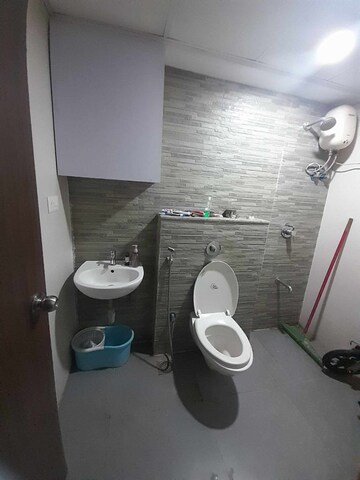 Bathroom in 1 BHK Apartment at Lodha Lakeshore Greens, Dombivli East – for Rent