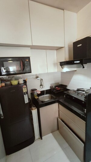 Master Bedroom in 1 BHK Apartment at Nagari Niwara CHS, Goregaon East – for Sale