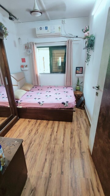 Bedroom in 1 BHK Apartment at Nagari Niwara CHS, Goregaon East – for Sale