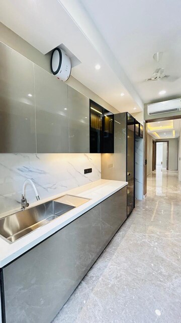 Kitchen in 4 BHK Builder Floor at Ansal Sushant Residency, Sushant Lok Iii – for Sale