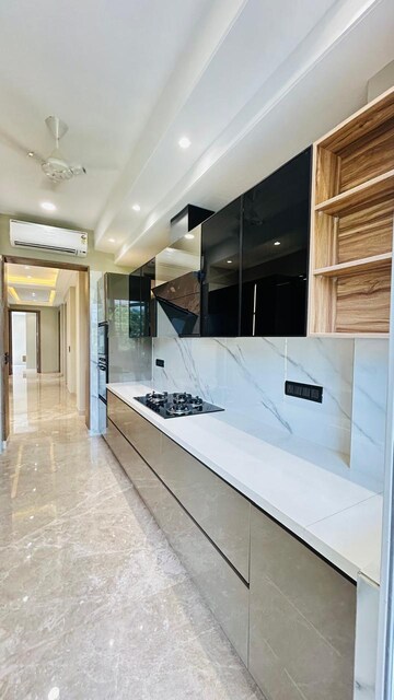 Kitchen in 4 BHK Builder Floor at Ansal Sushant Residency, Sushant Lok Iii – for Sale