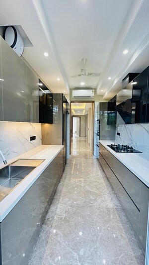 Kitchen in 4 BHK Builder Floor at Ansal Sushant Residency, Sushant Lok Iii – for Sale