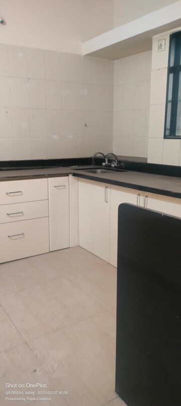 Kitchen in 3 BHK Apartment at Border Road Housing Society, Dhanori – for Rent