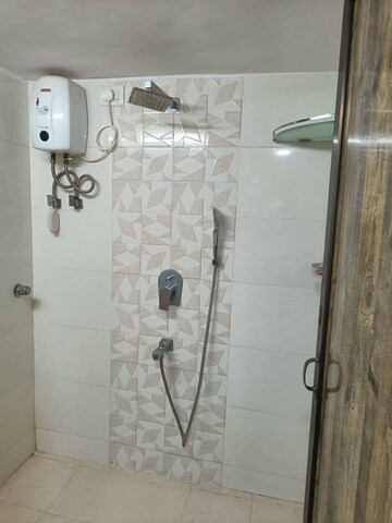 Bathroom in 1 BHK Apartment at Accord CHS Andheri West, Andheri West – for Rent