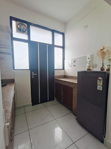 Kitchen in 1.5 BHK Builder Floor at Ansal Sushant Apartments, Sushant Lok I – for Rent