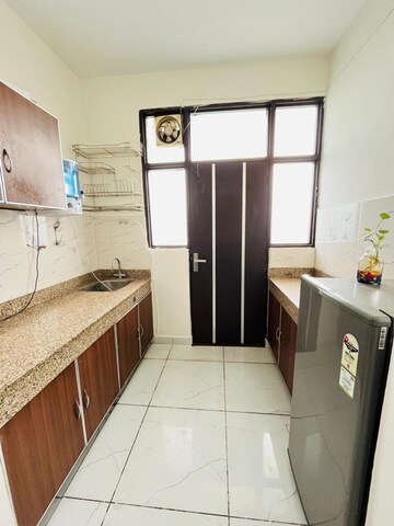 Kitchen in 1.5 BHK Builder Floor at Ansal Sushant Apartments, Sushant Lok I – for Rent