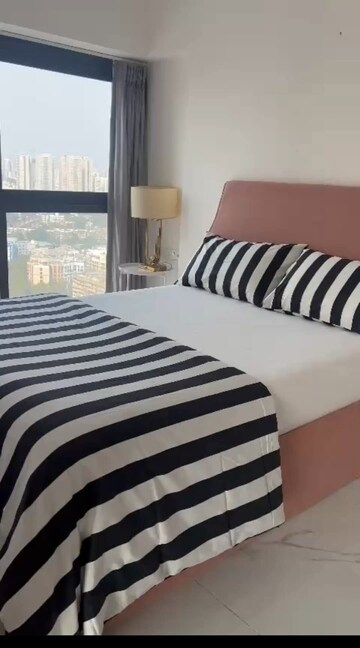 Bedroom in 2 BHK Apartment at Kalindi Tower, Oshiwara – for Rent