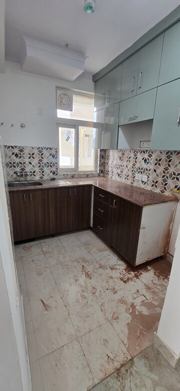 Kitchen in 3 BHK Apartment at Amrapali Riverview, Amrapali Leisure Valley – for Rent