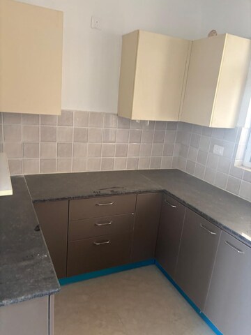 Kitchen in 3 BHK Apartment at ATS Rhapsody, Sector 1 Greater Noida – for Rent