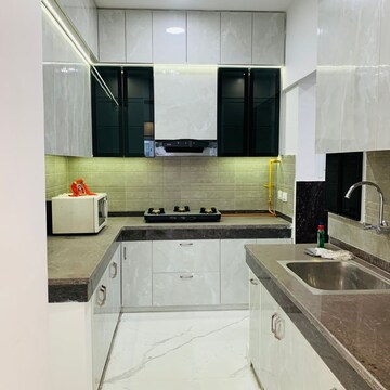 Kitchen in 2.5 BHK Apartment at Ace Divino, Aimnabad – for Sale