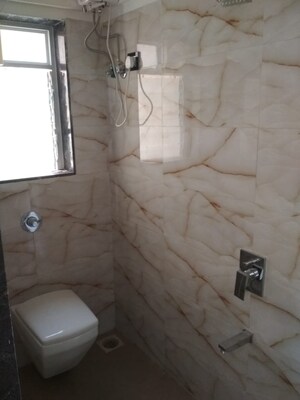 Bathroom in 1 BHK Apartment at Divyam Heights, Andheri West – for Sale