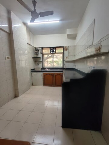 Kitchen in 2 BHK Apartment at Tirumala CHS, Malad West – for Rent