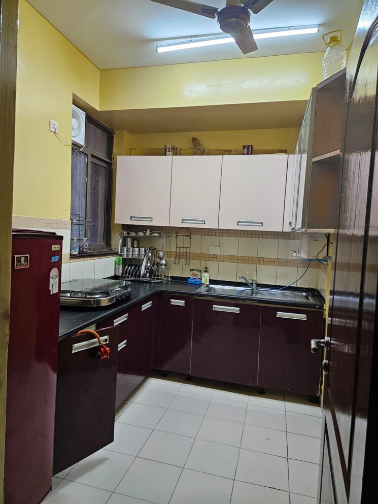 Kitchen, unitech-uniworld-gardens 2 Bedroom 973 Sq.Ft. Apartment In Sector 47 Gurgaon 8918503