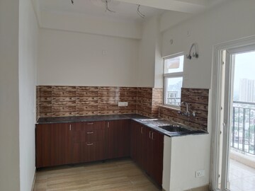 Kitchen in 2 BHK Apartment at Amrapali Terrace Homes, Tech Zone 4 Greater Noida – for Rent