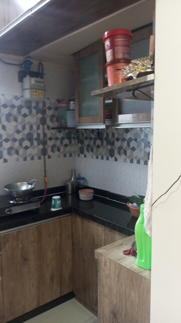 Kitchen in 1 BHK Apartment at Raunak Unnathi Woods Phase 7 A And B, Ghodbunder Road – for Sale