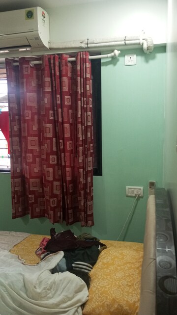 Living Room in 1 BHK Apartment at Raunak Unnathi Woods Phase 7 A And B, Ghodbunder Road – for Sale