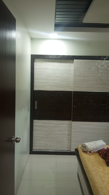 Bathroom in 1 BHK Apartment at Raunak Unnathi Woods Phase 7 A And B, Ghodbunder Road – for Sale