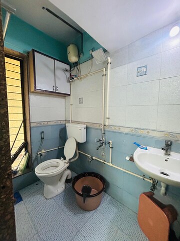 Bathroom in 1 BHK Apartment at Surya Kiran CHS Ghansoli, Ghansoli – for Rent