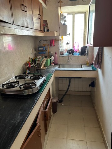 Kitchen in 2 BHK Apartment at Rail Vihar Apartment, Sector 15 – for Rent