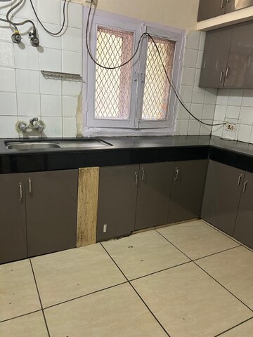 Kitchen in 4 BHK Apartment at Jubilee Apartments, Sector 15 – for Rent