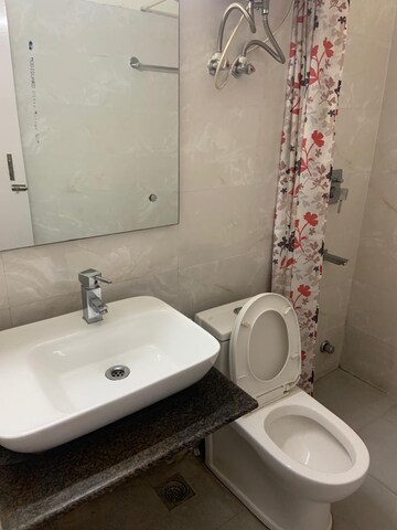 Bathroom in 2 BHK Apartment at Unitech Heritage City, Sector 25 – for Rent