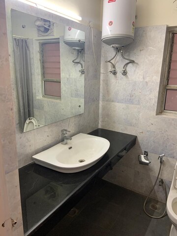 Bathroom in 2 BHK Apartment at Unitech Heritage City, Sector 25 – for Rent