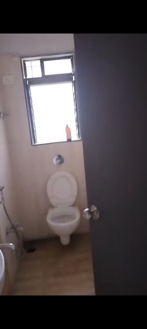 Bathroom in 1 BHK Apartment at Nirmaan Shivneri CHS, Andheri West – for Sale