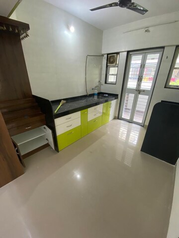 Kitchen in 2 BHK Apartment at Vyas Sudhendu CHS, Kothrud – for Sale