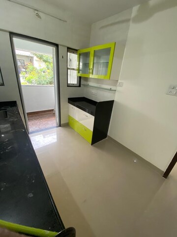 Kitchen in 2 BHK Apartment at Vyas Sudhendu CHS, Kothrud – for Sale