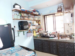 Kitchen in 1 BHK Apartment at Status Apartment Santacruz, Santacruz East – for Sale
