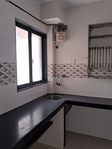 Kitchen in 2 BHK Apartment at Tanvar Villa CHS, Kopar Khairane – for Rent